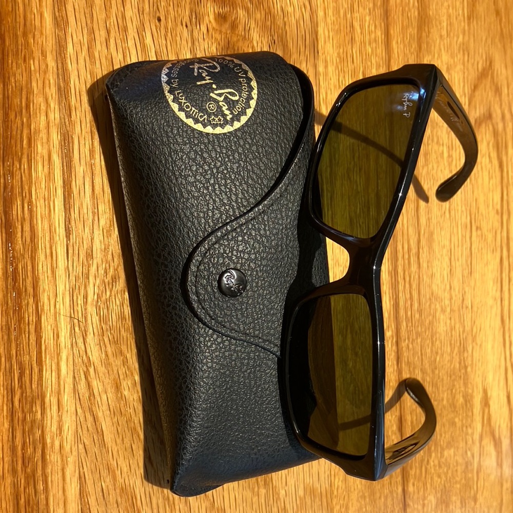 Ray Ban sunglasses. Great condition. 100% UV protection. Black frame with case.